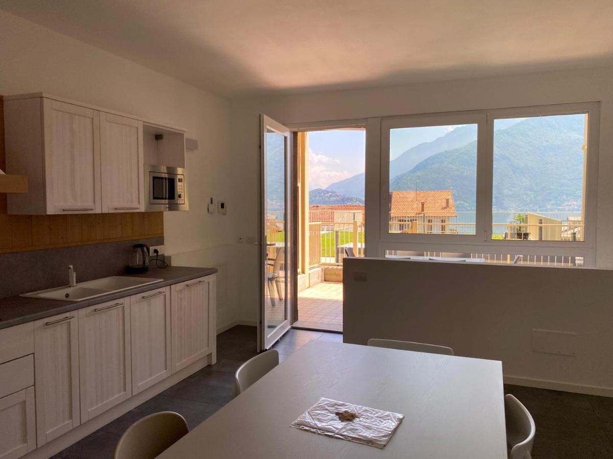Modern Apartments Lake View With Pool Musso Exterior photo